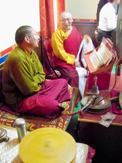 Lamala visiting with local monk.