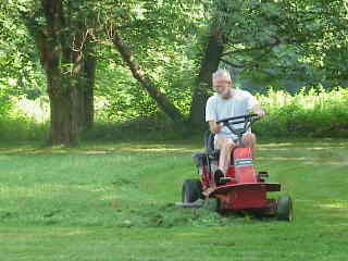 Brian mowing.