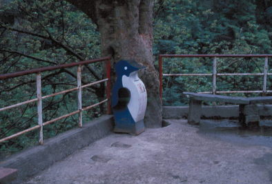 Penguin trash can.